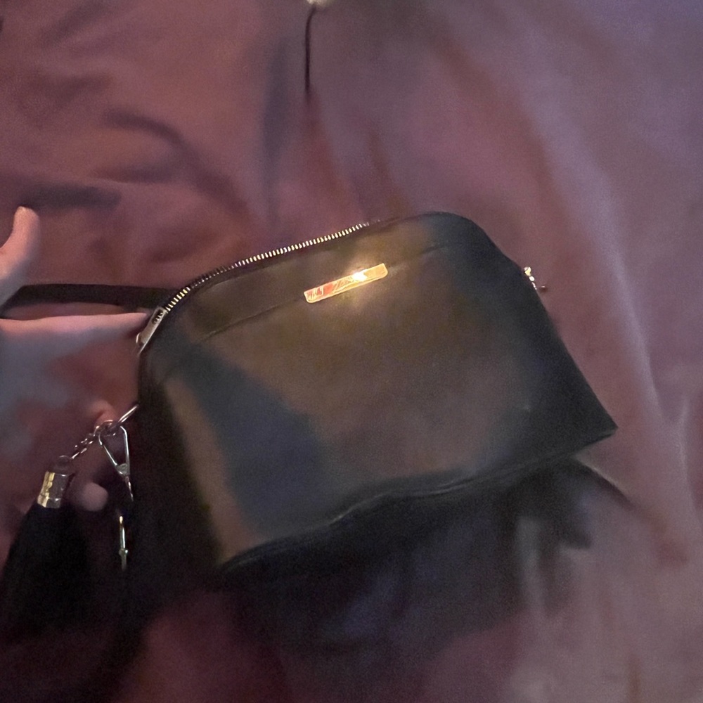 Black Leather Crossbody Bag with Gold Accent